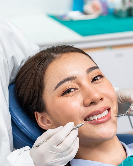 Woman smiling at the dentist