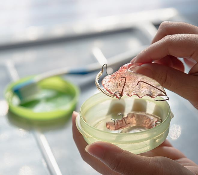 Woman with a retainer