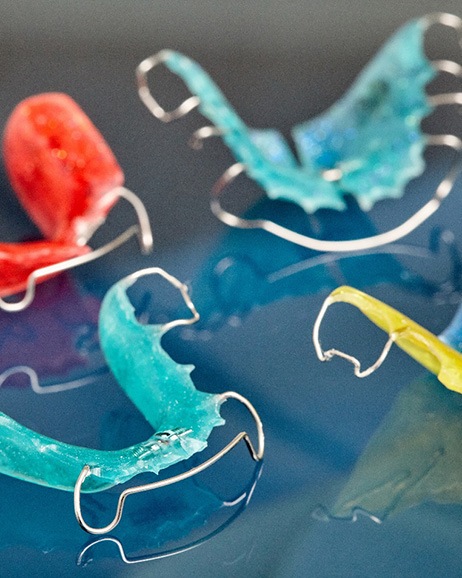 Woman holding a retainer