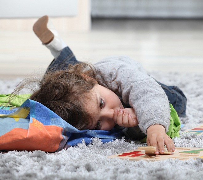Child sucking her thumb